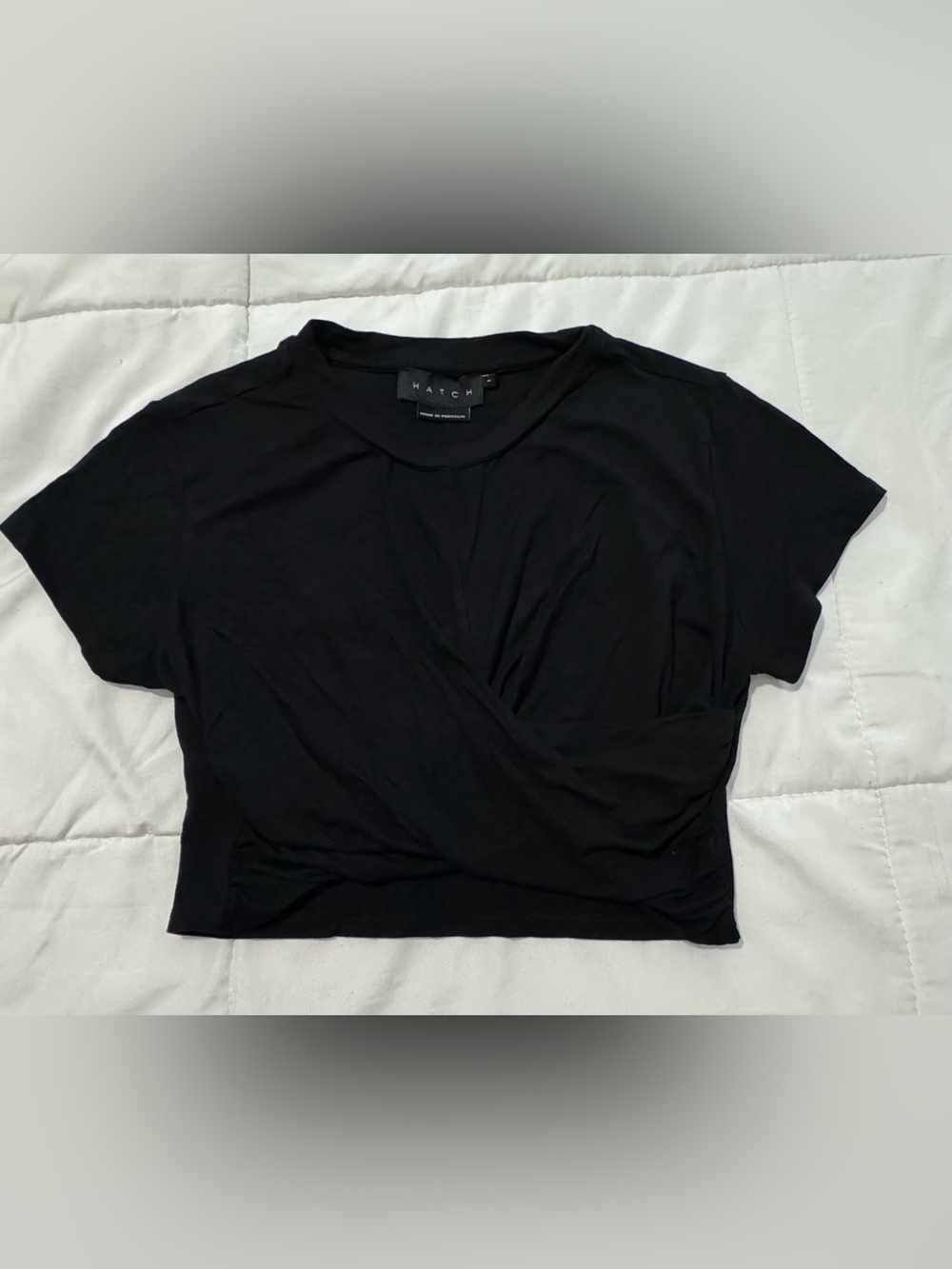 black maternity crossover short sleeve crop top.